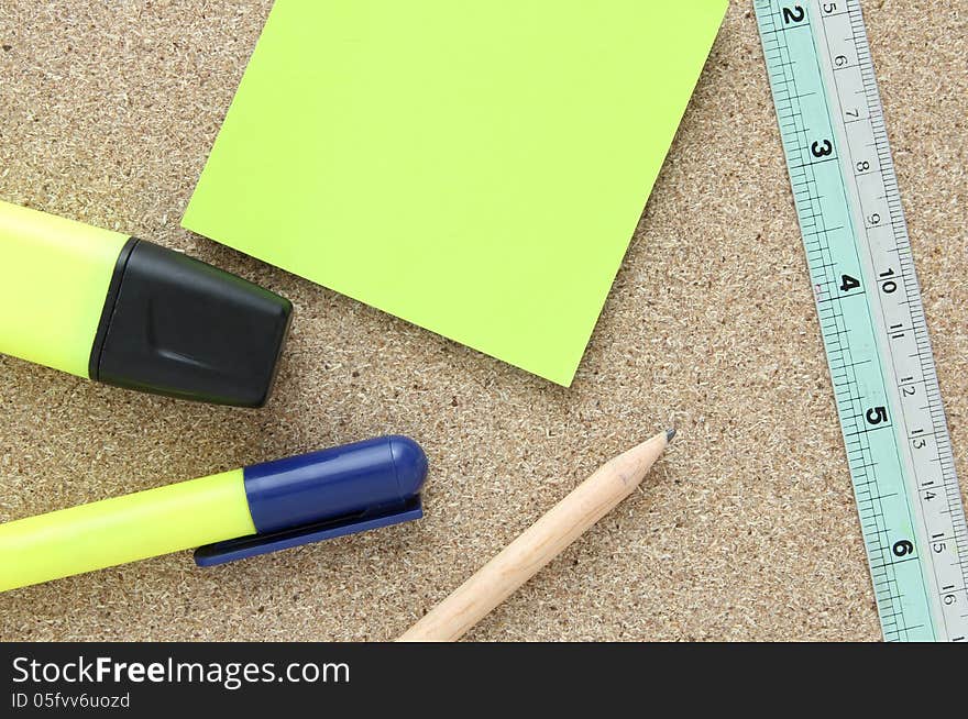 Office tools on cork board