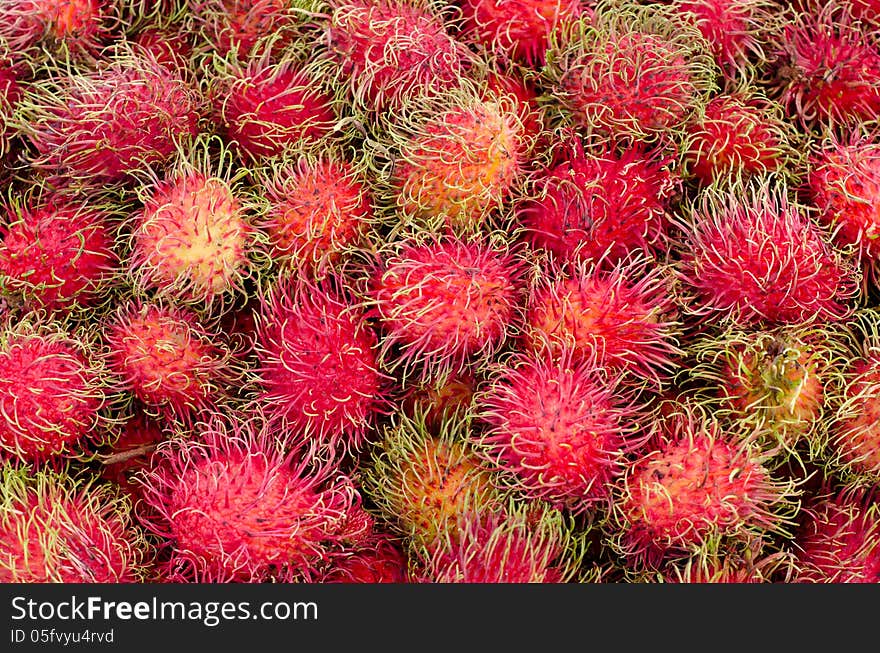 Red rambutan background and texture. Red rambutan background and texture