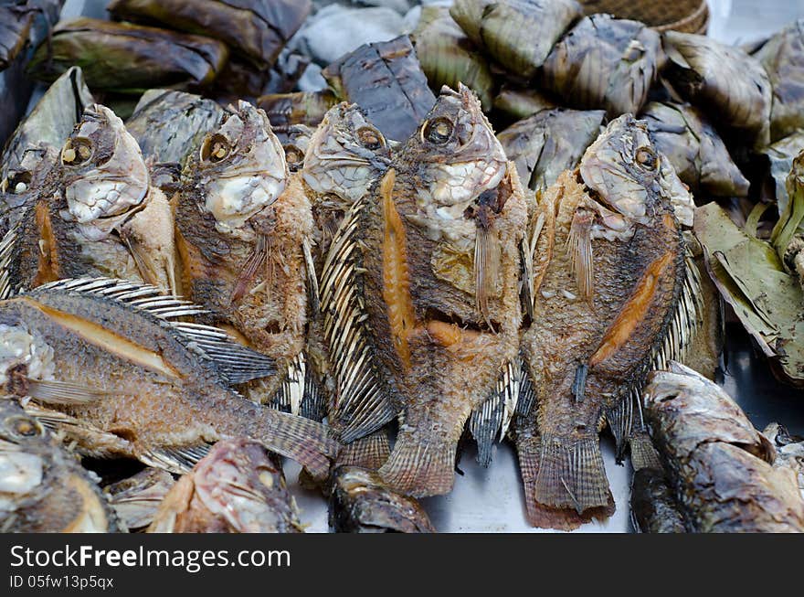 Fried tilapia fish in local market, Thailand