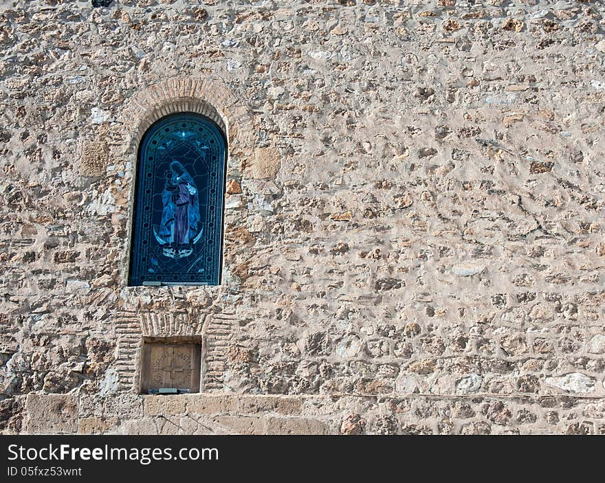 Stained glass window in a stone church in almeria