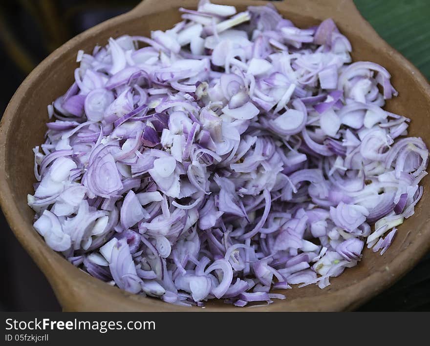 Scallion in the clay dish. Scallion in the clay dish