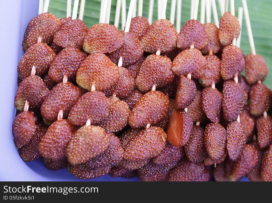 Strawberry on a banana leaf