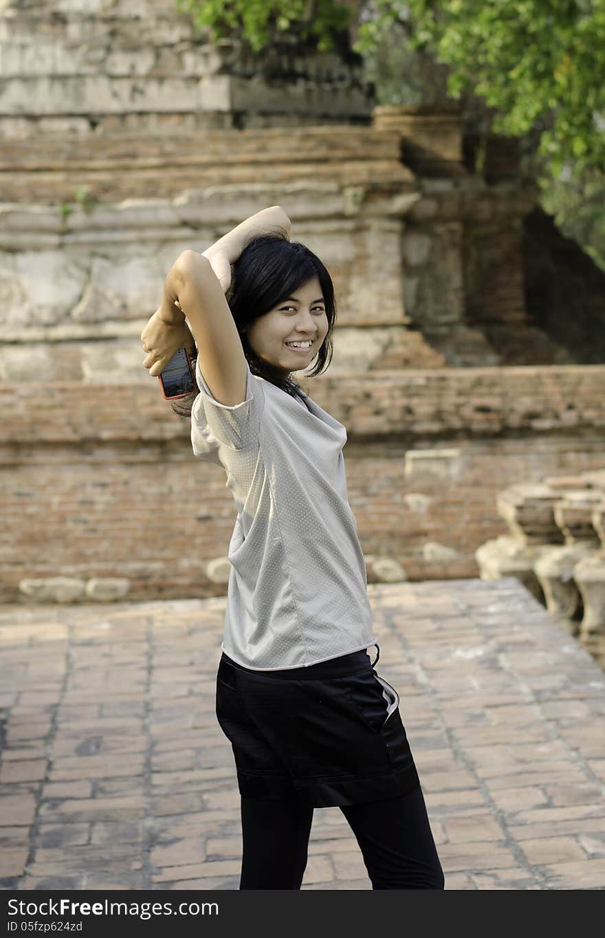 Asian woman at Wat Maheyong Temple. Ayutthaya - Thailand