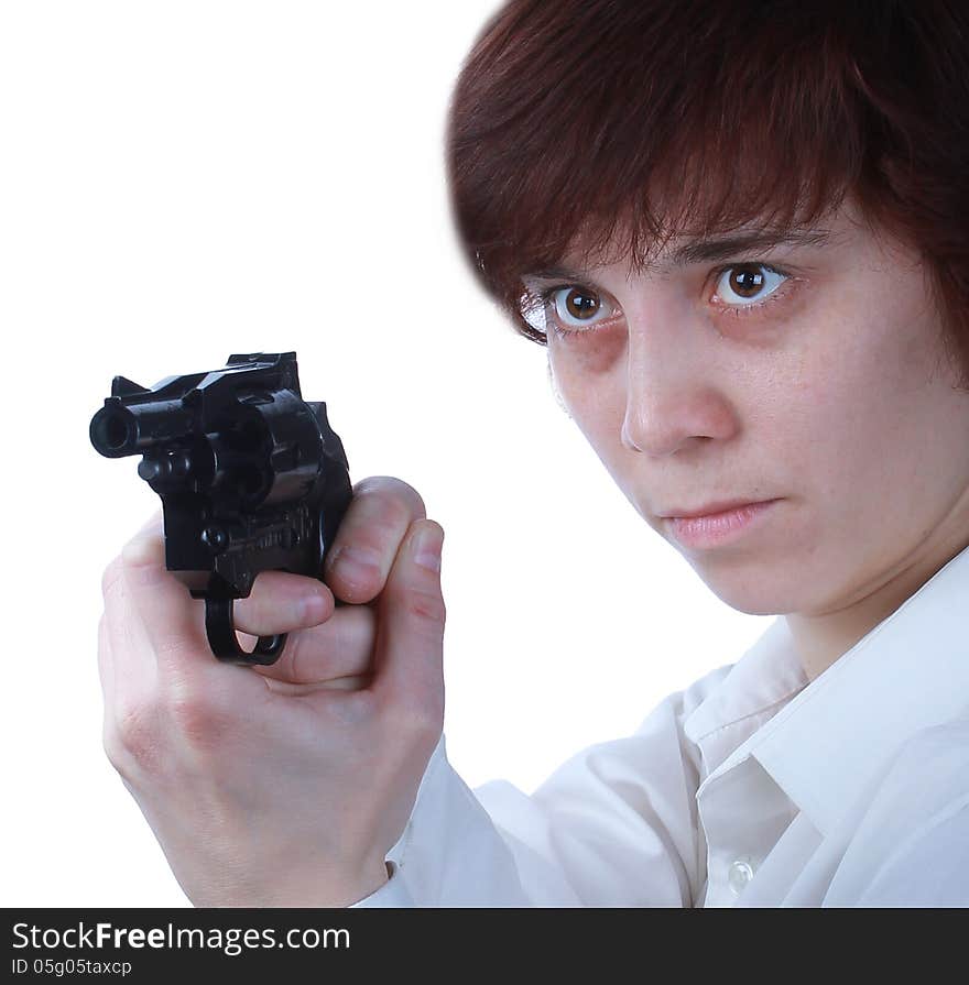 Professional woman who is holding a gun pointing it at a target on a white background. Professional woman who is holding a gun pointing it at a target on a white background