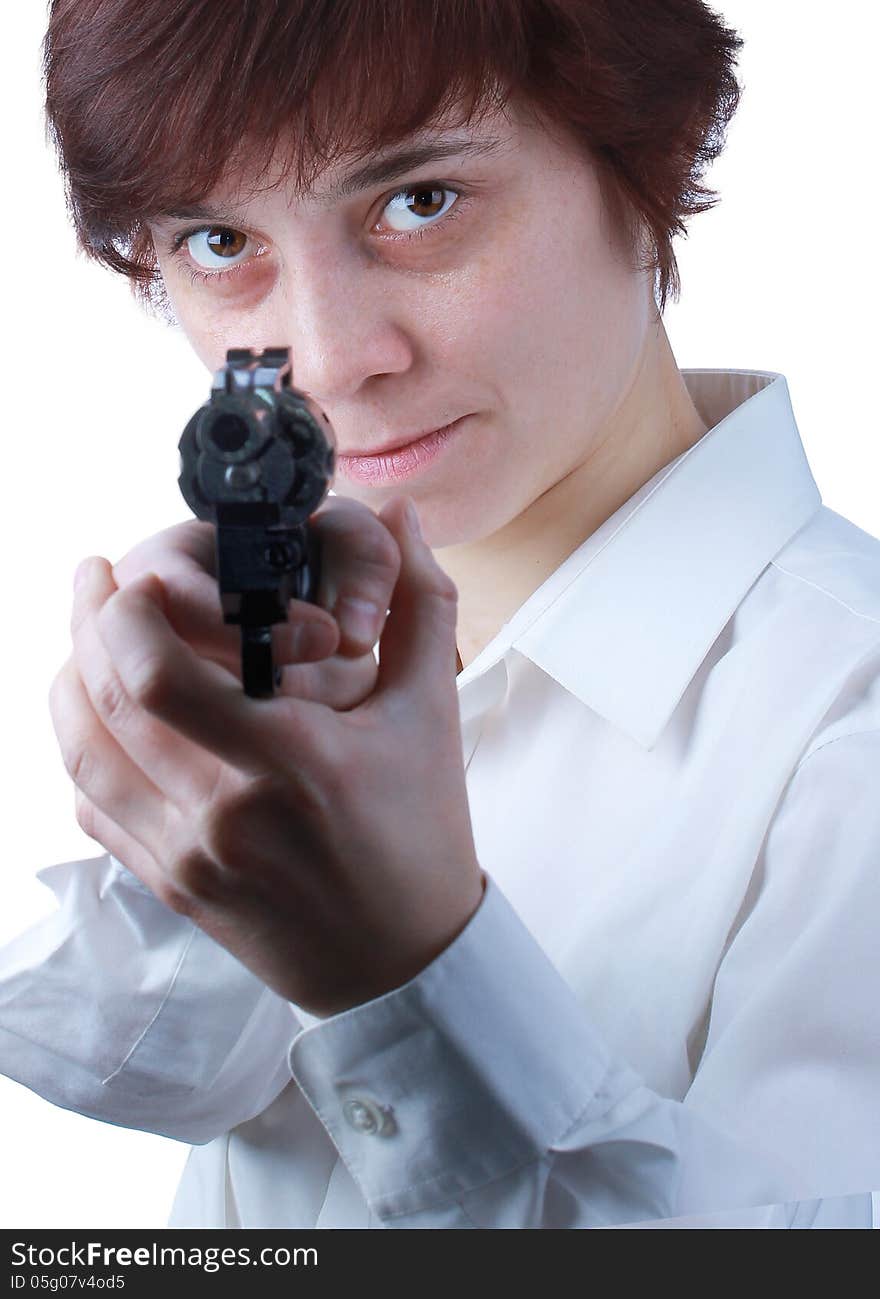 Professional woman who is holding a gun pointing it at a target on a white background. Professional woman who is holding a gun pointing it at a target on a white background