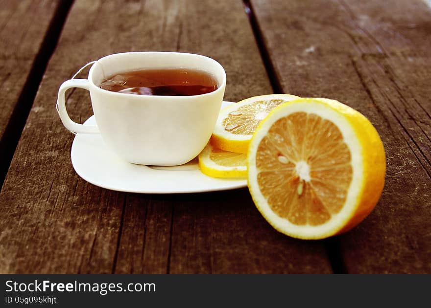 Cup of tea on wooden bachground