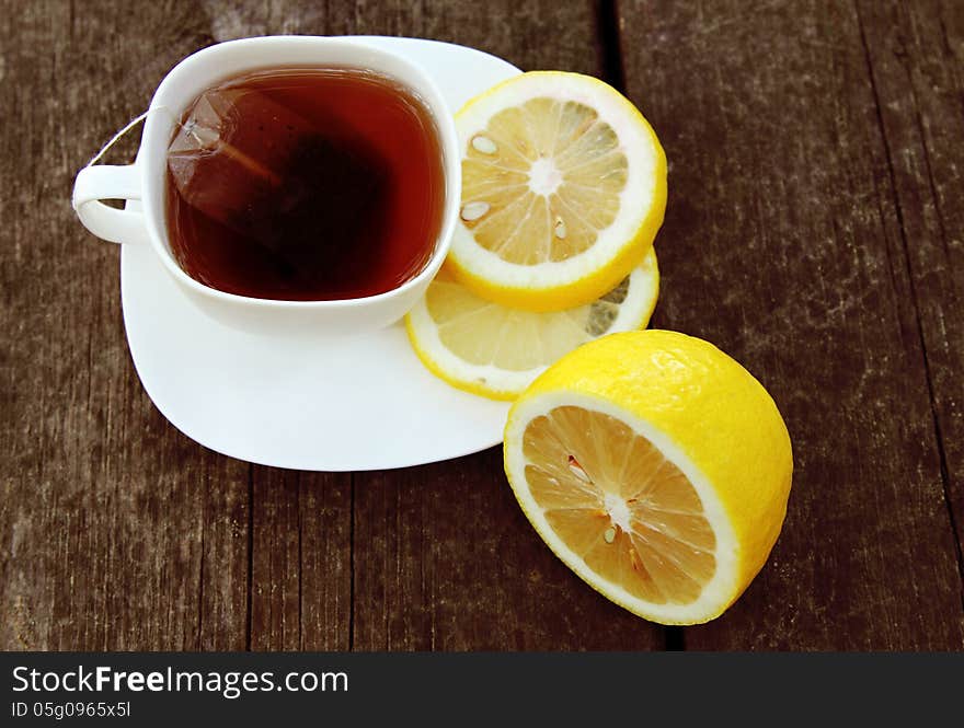 Cup of tea on wooden bachground