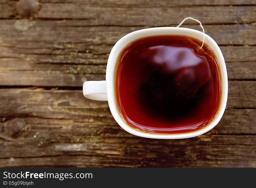 Cup of tea on wooden bachground