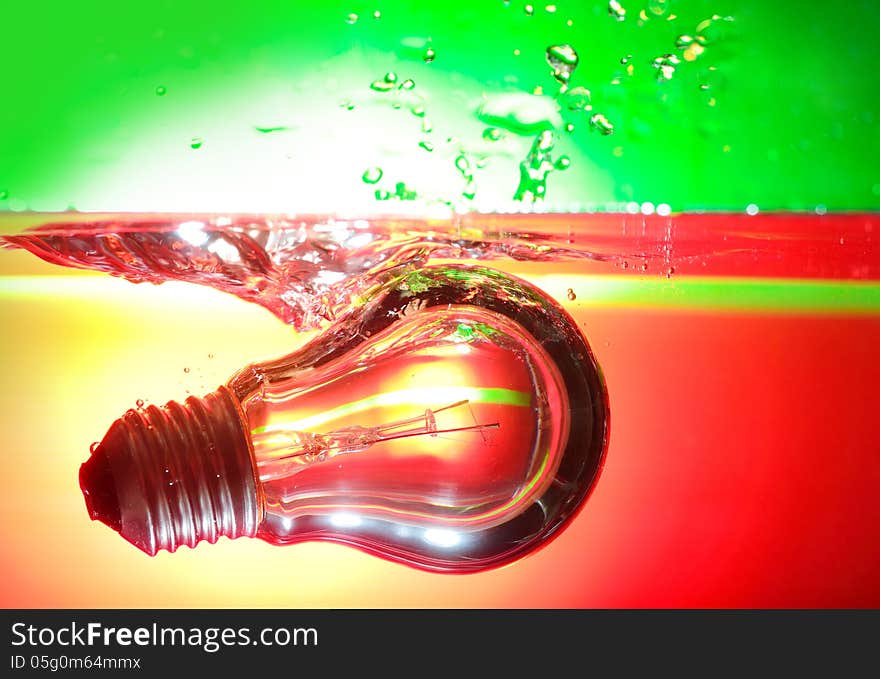 Red and green light and lamp deep underwater