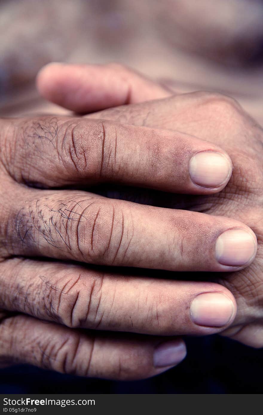 Close up image of old man hand