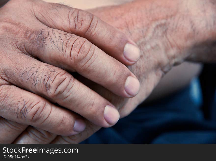 Close up image of old man hand