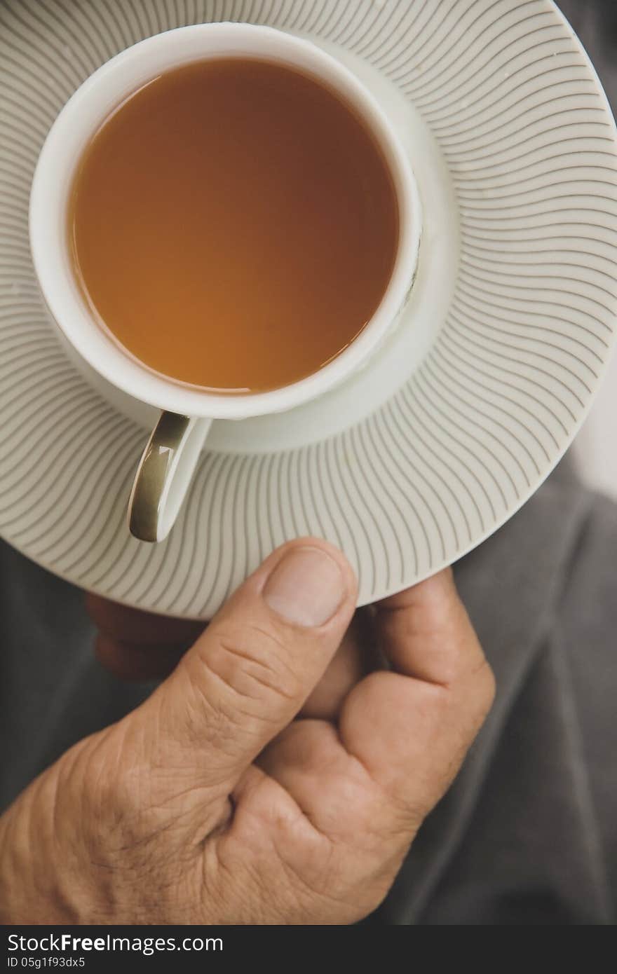 Hand Ilfts A Cup Of Tea