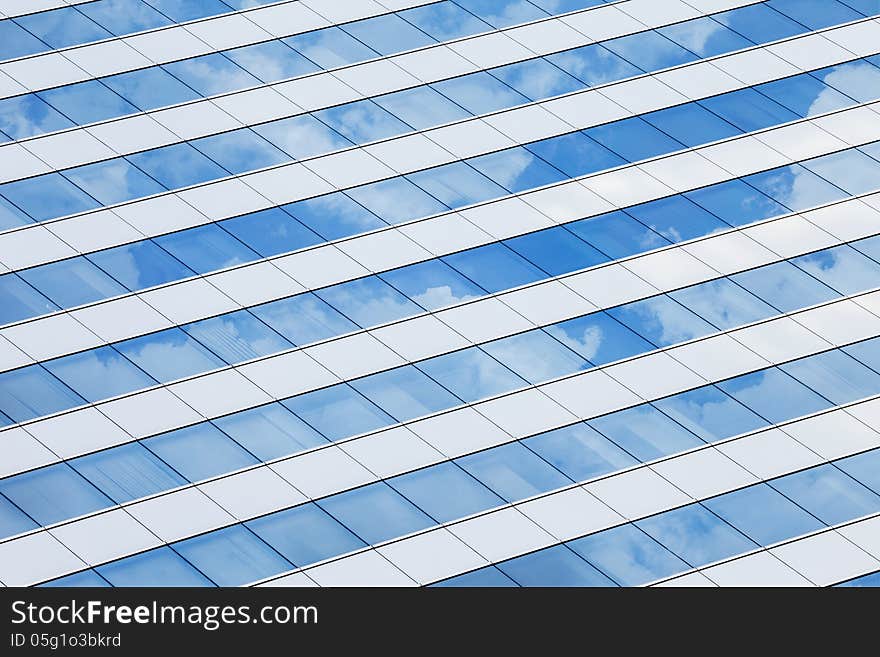 Blue windows of an office with reflection