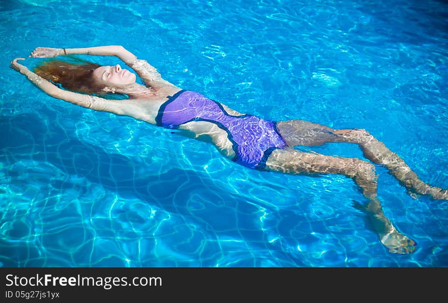 Young woman in the pool. Young woman in the pool