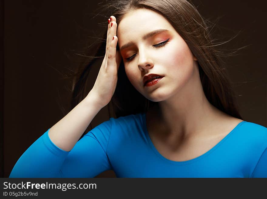 Woman Touching her Forehead. Stress. Woman Touching her Forehead. Stress