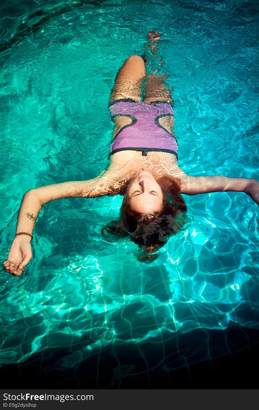 Young woman in the pool. Young woman in the pool