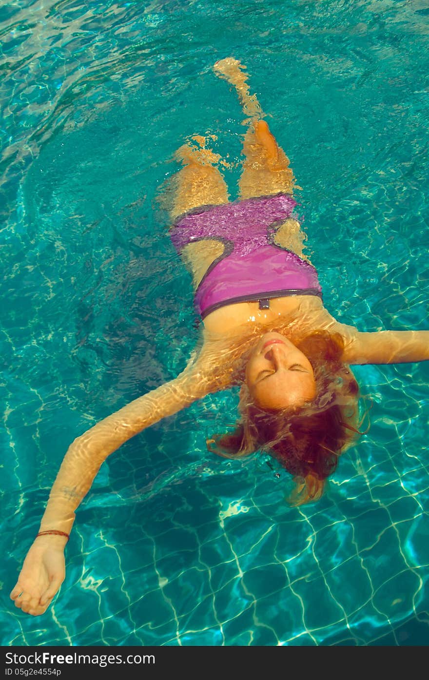 Young woman in the pool. Young woman in the pool