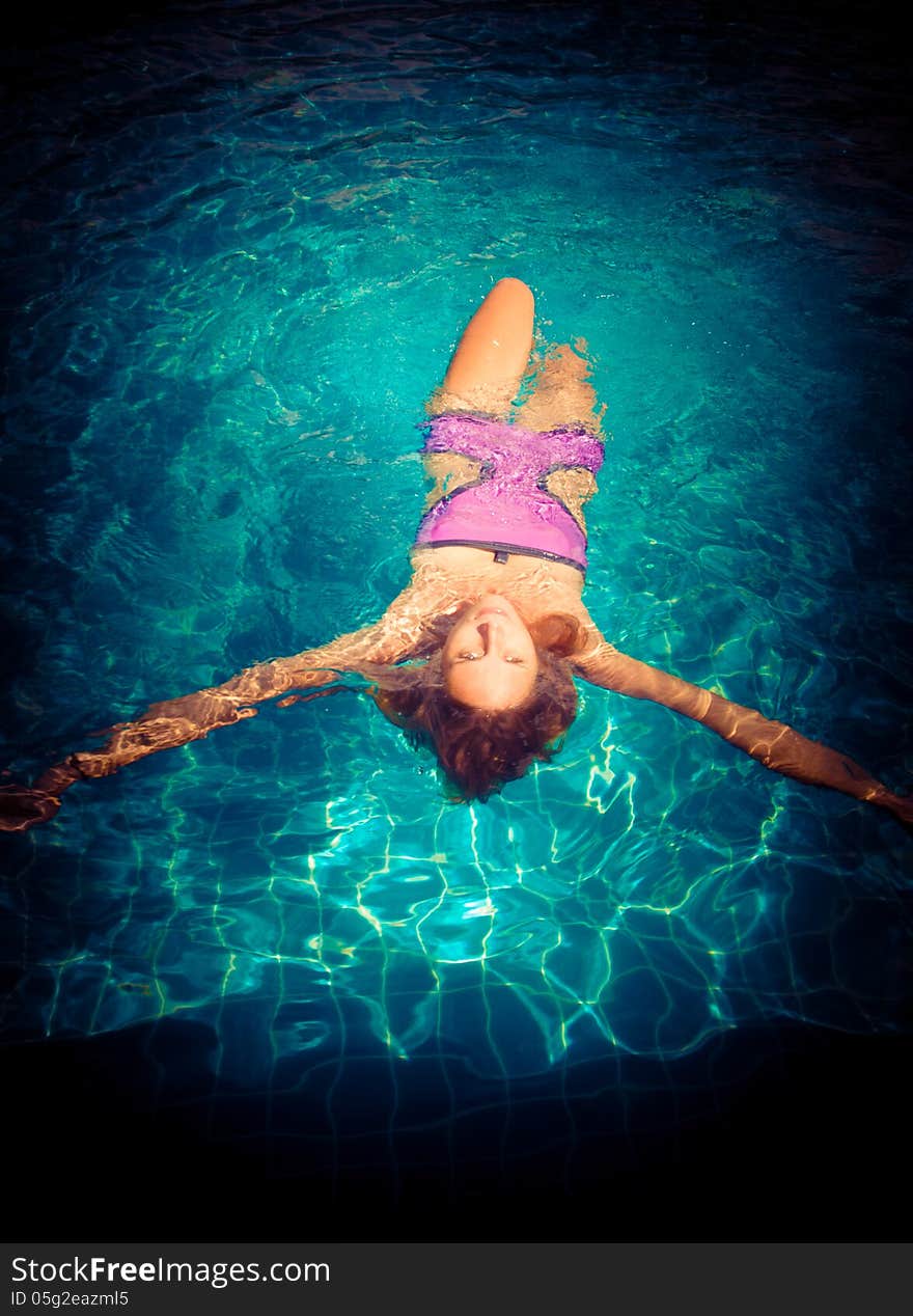 Young woman in the pool. Young woman in the pool