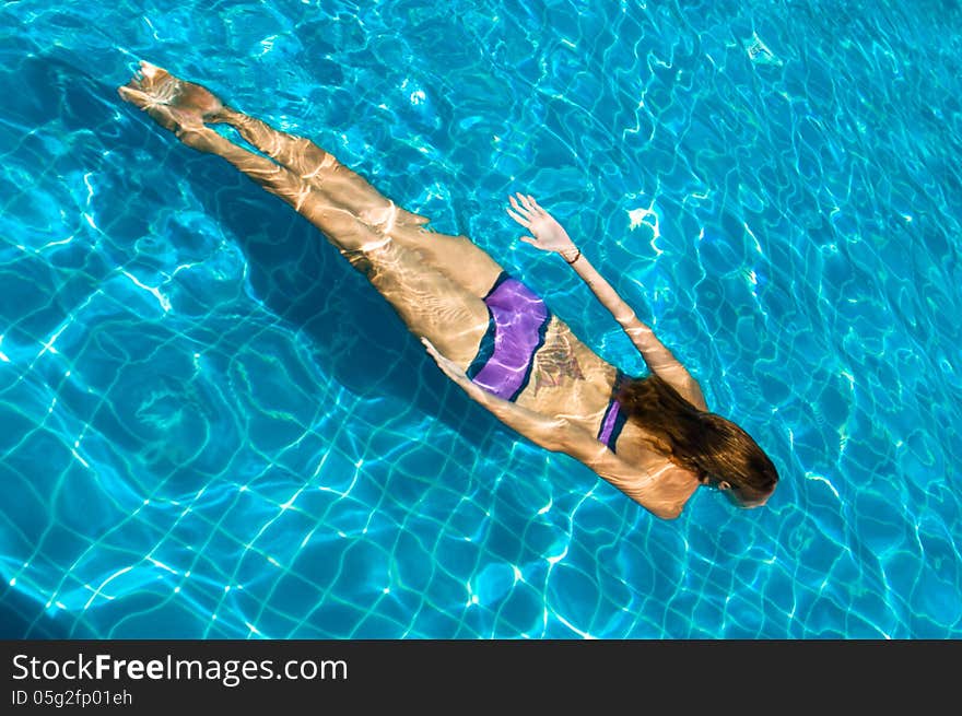 Young woman in the pool. Young woman in the pool