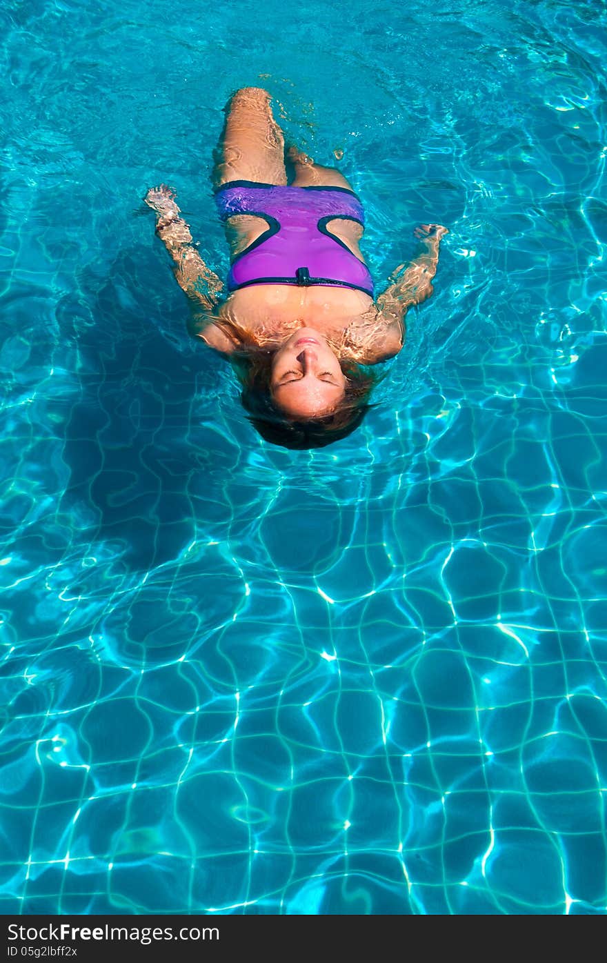 Young woman in the pool. Young woman in the pool