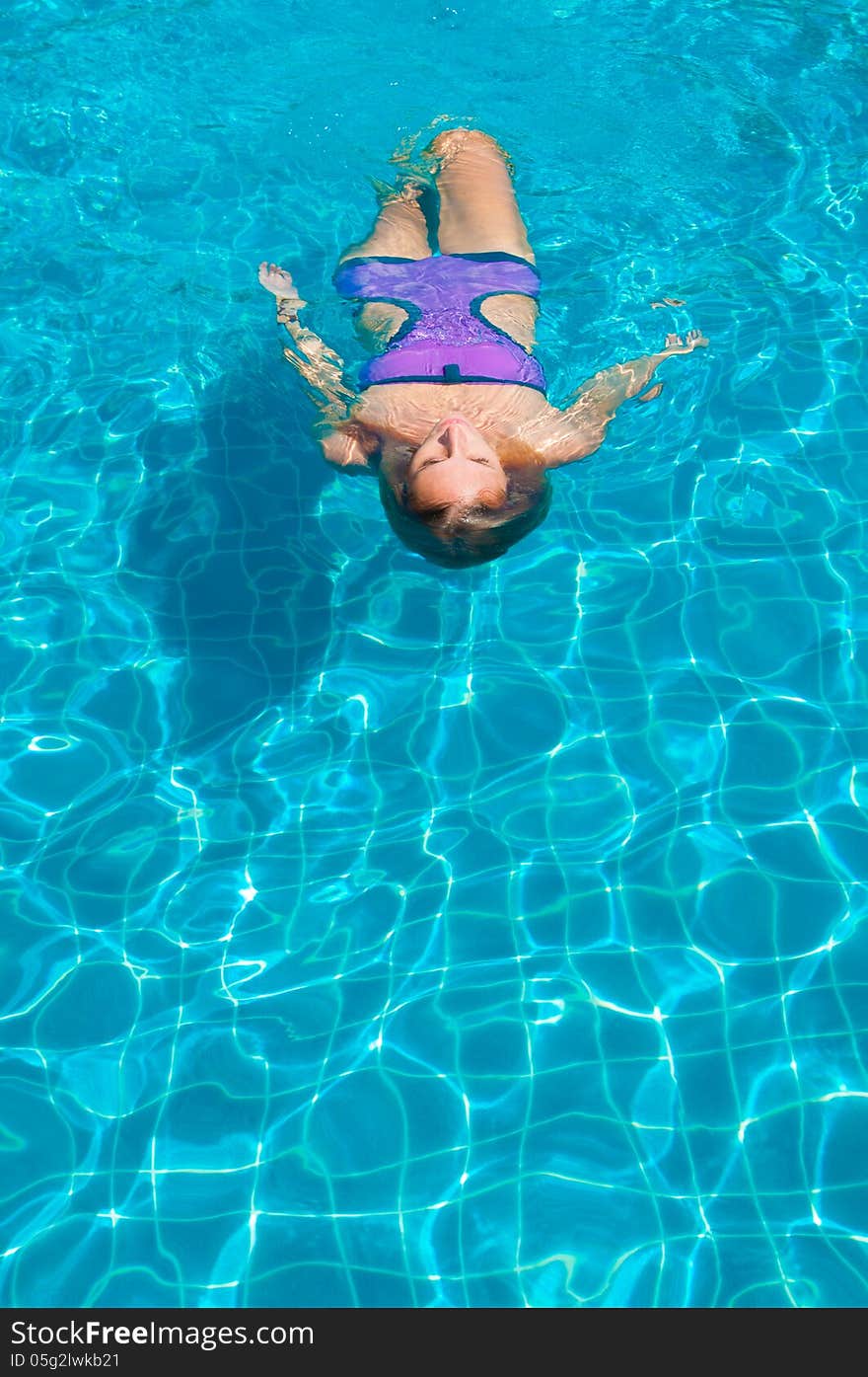 Young woman in the pool. Young woman in the pool