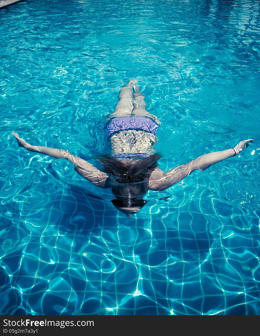 Young woman in the pool. Young woman in the pool