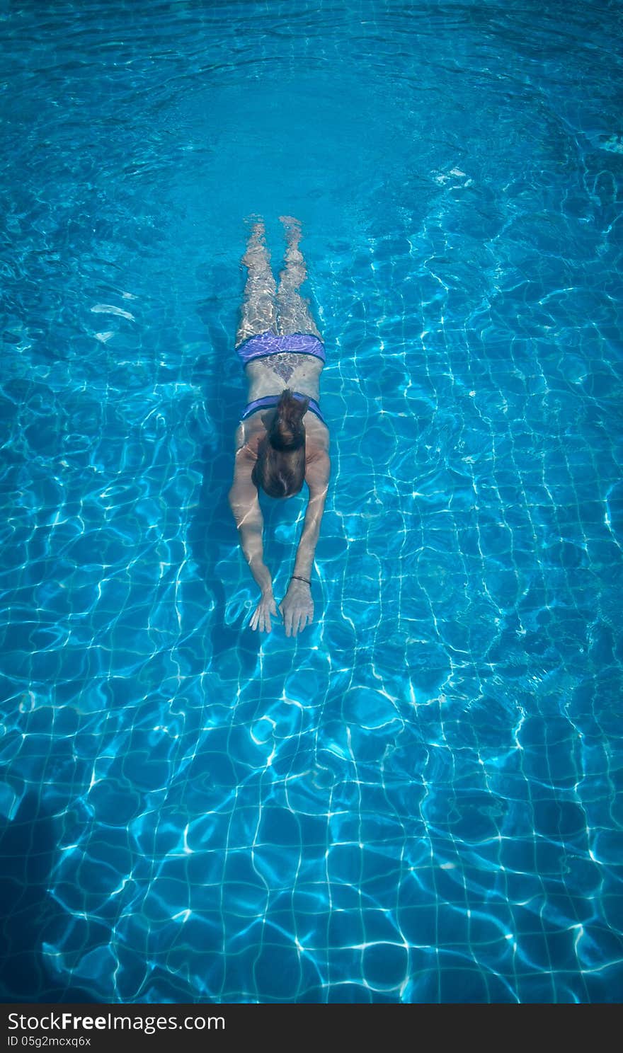 Young woman in the pool. Young woman in the pool