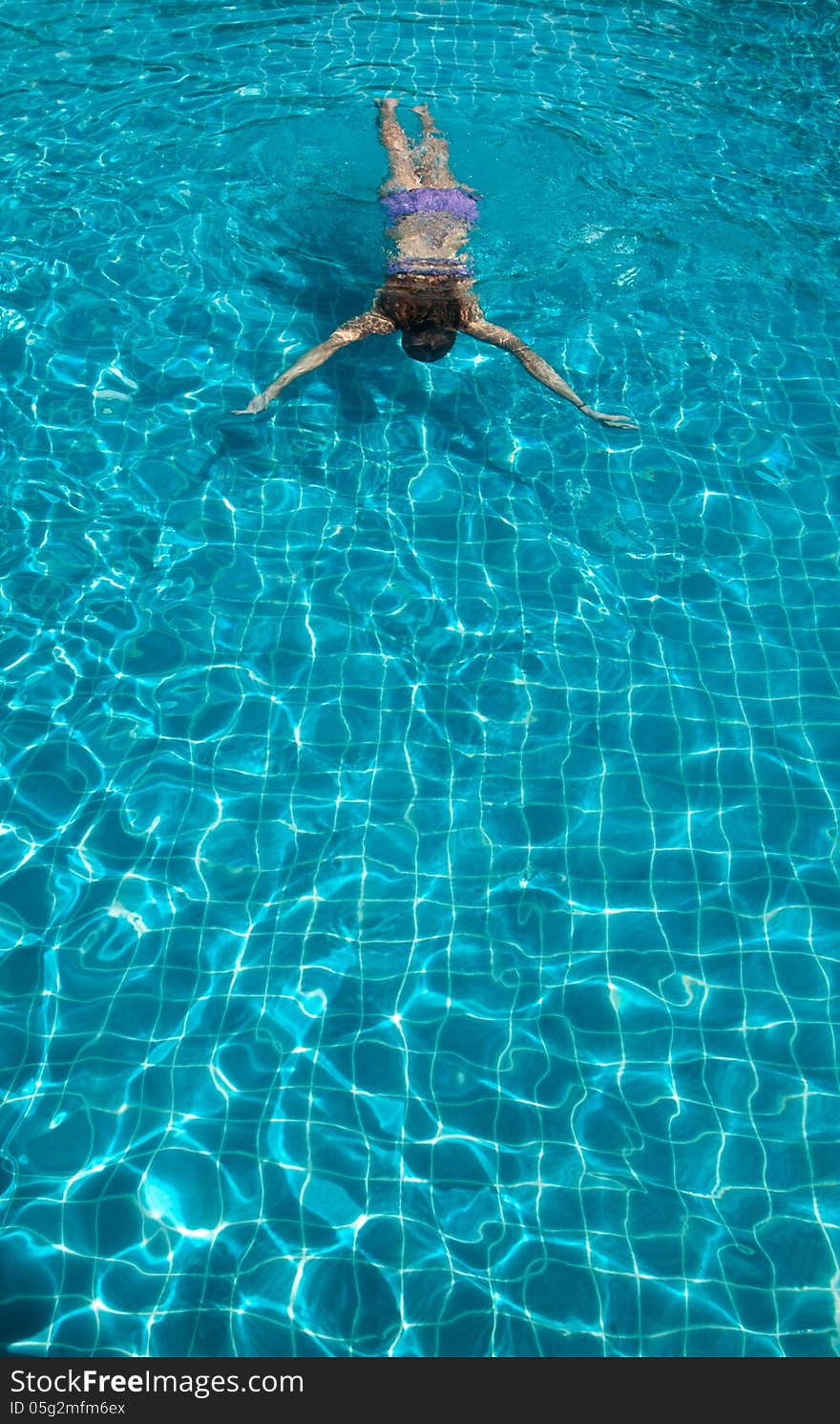 Young woman in the pool. Young woman in the pool