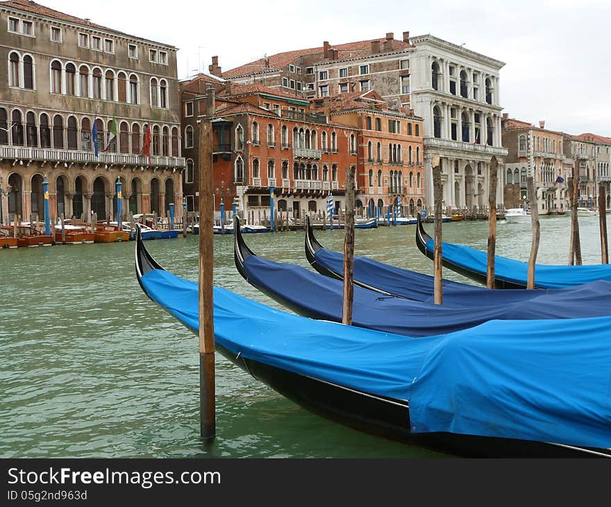 Venice - a view of the Grand Canal with gondolas and boats. Venice - a view of the Grand Canal with gondolas and boats