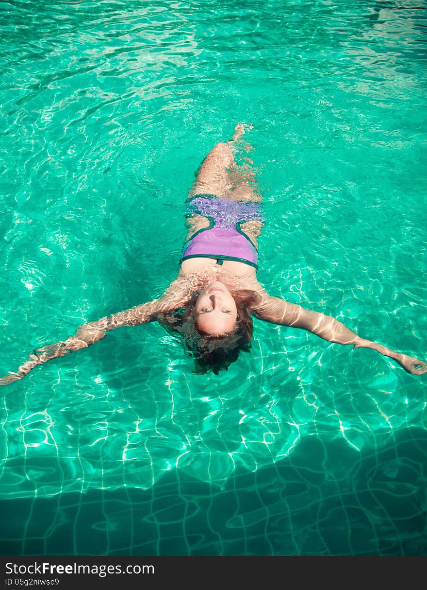 Young woman in the pool. Young woman in the pool