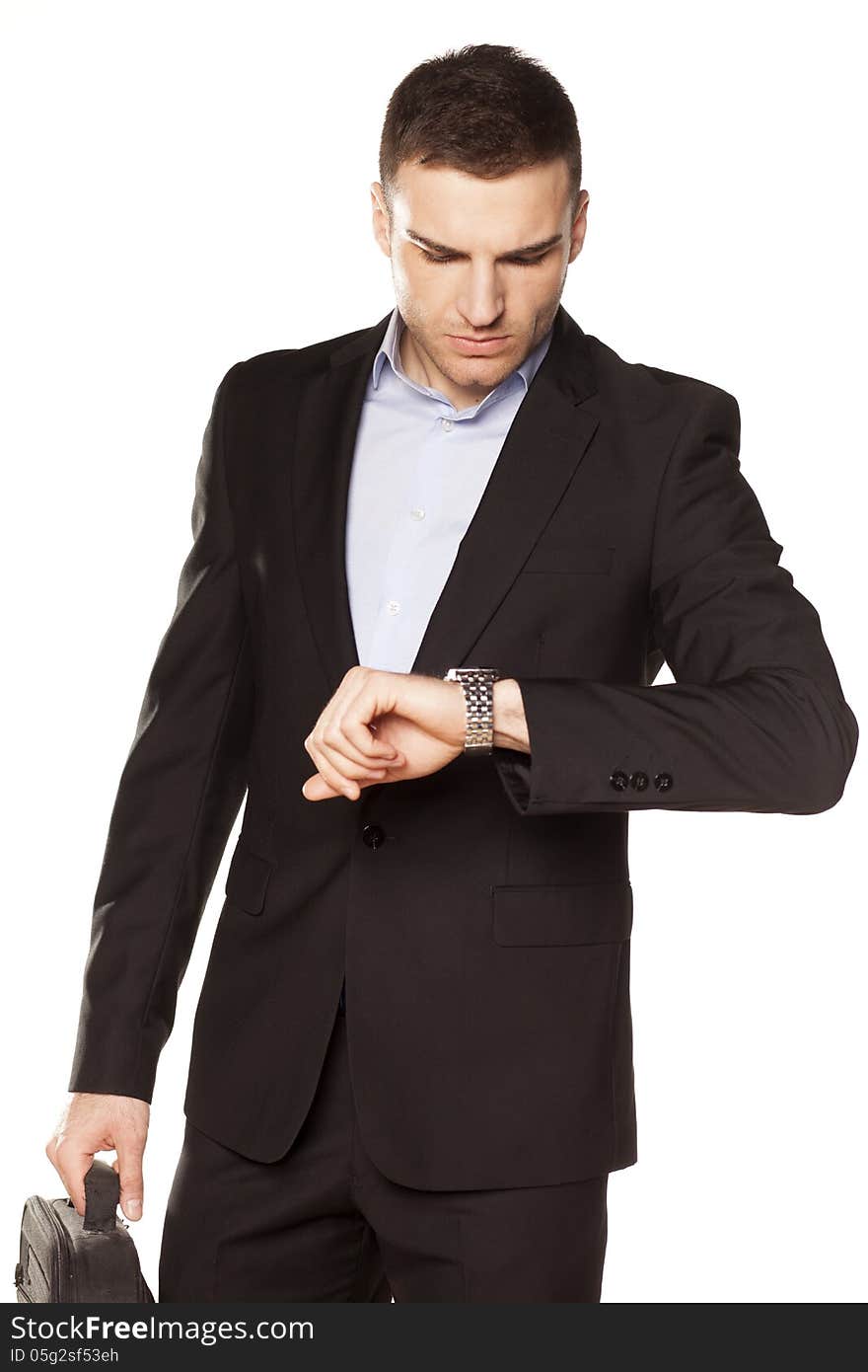 Businessman looking at his watch