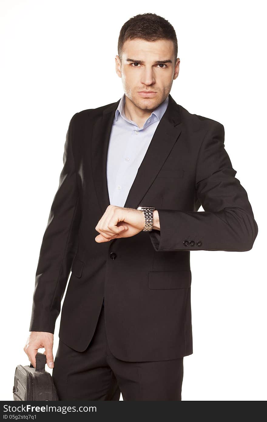 Businessman looking at his watch