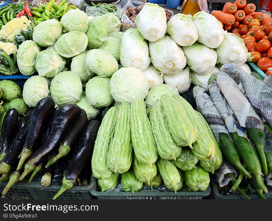 Assorted fruit and vegetable trays in the street market, thailand