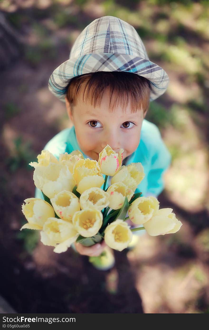 Child with tulips