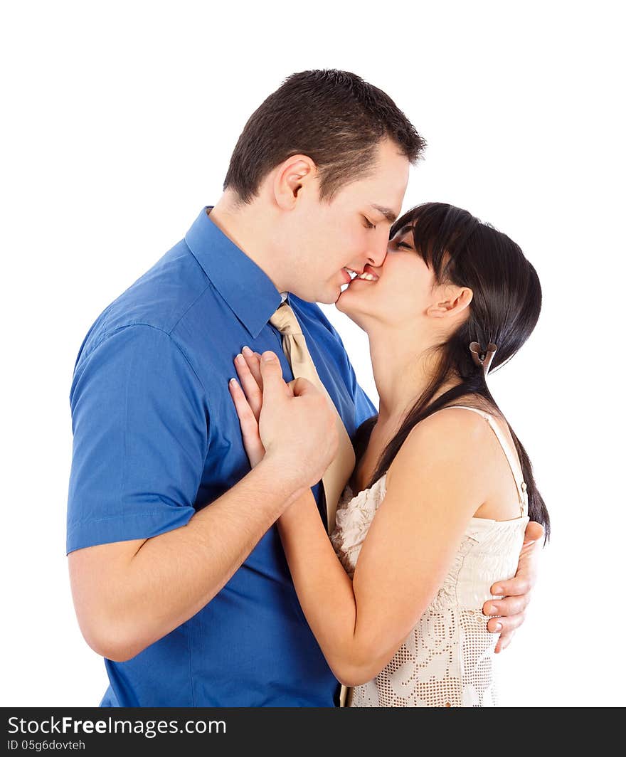 Young couple having an intimate moment - kissing. Young couple having an intimate moment - kissing.