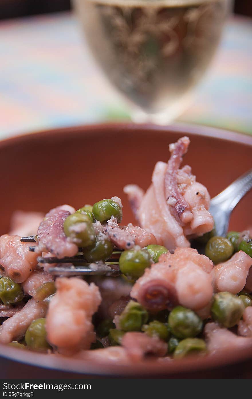 Octopus with green peas