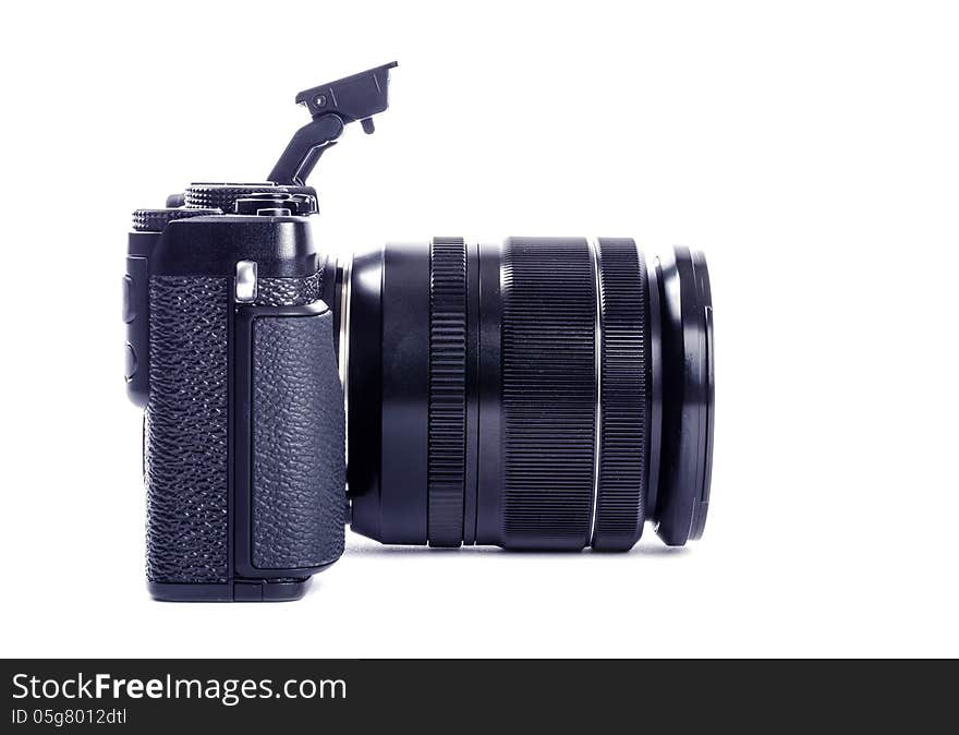 Profile image of a black compact system camera isolated on white #3. Profile image of a black compact system camera isolated on white #3.