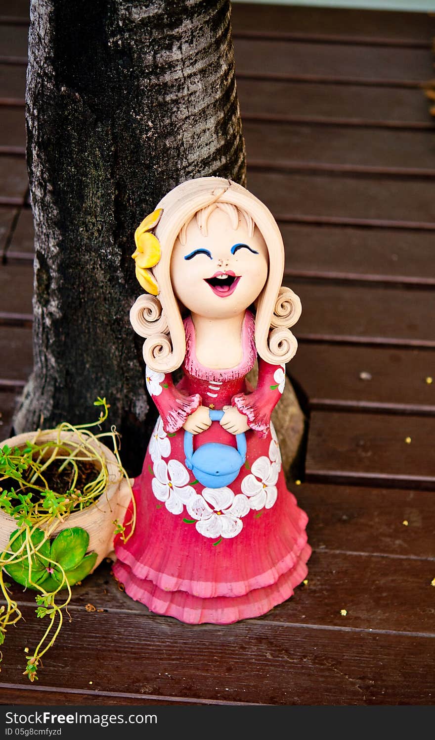 Girl clay dolls in garden. Girl clay dolls in garden