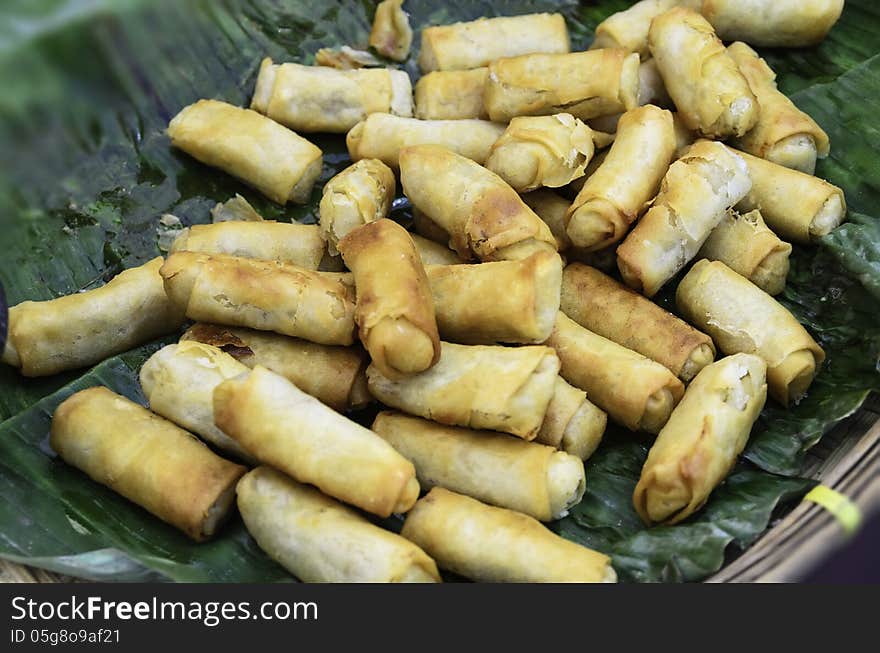 Fried dough on banana leaf