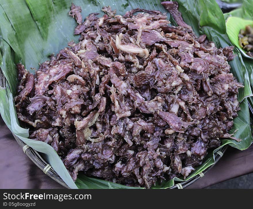 Dried pork on banana leaves