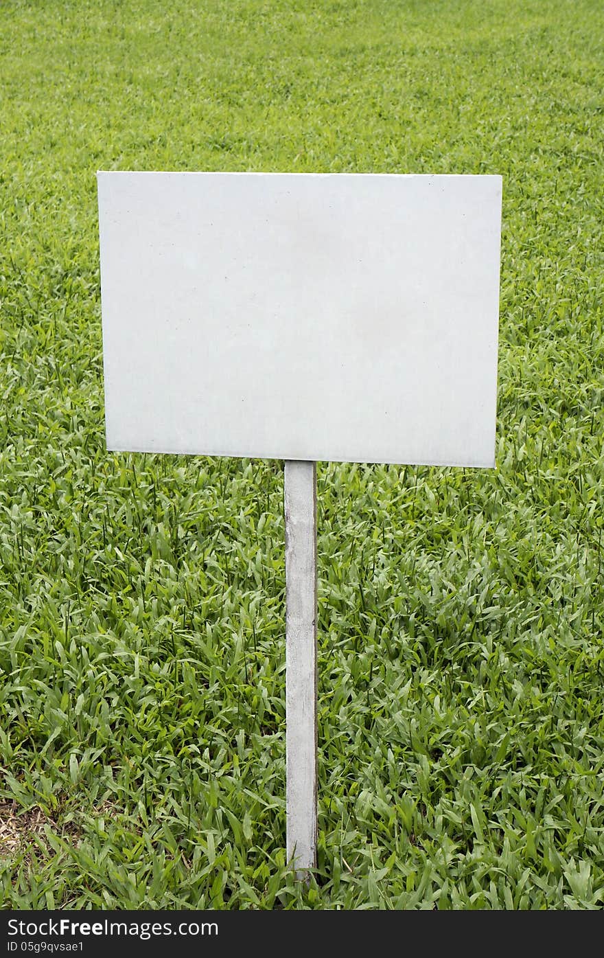 Blank sign in grassland