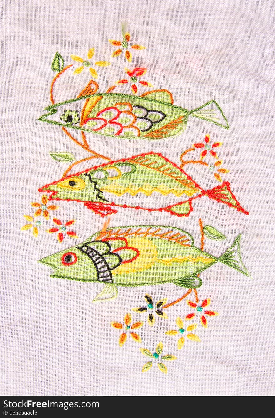 Cloth embroidery of fish.