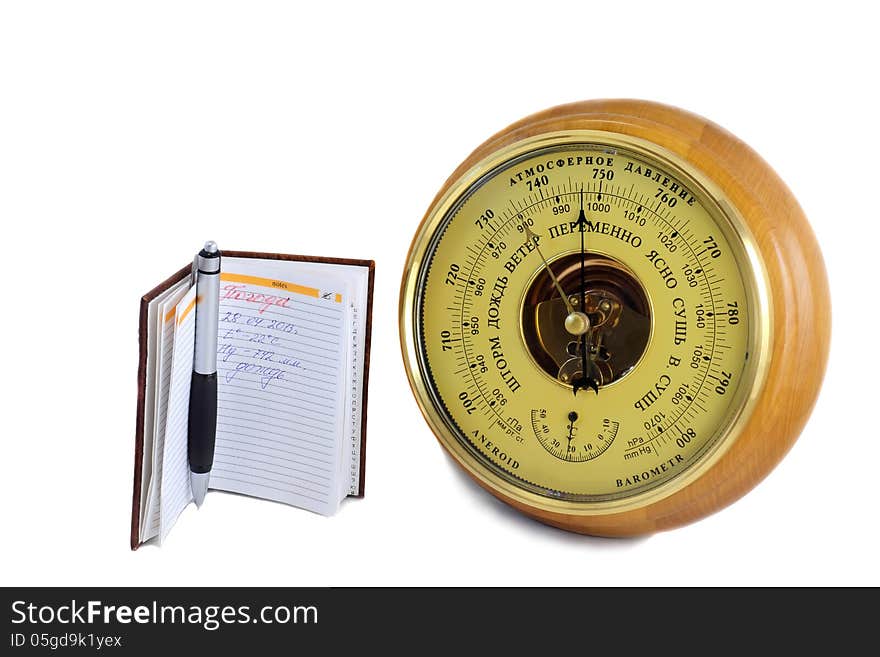 Barometer - Aneroid And The Notebook On A White Background