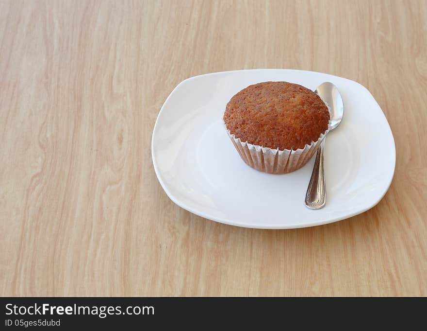 Banana cake on the desk wooden