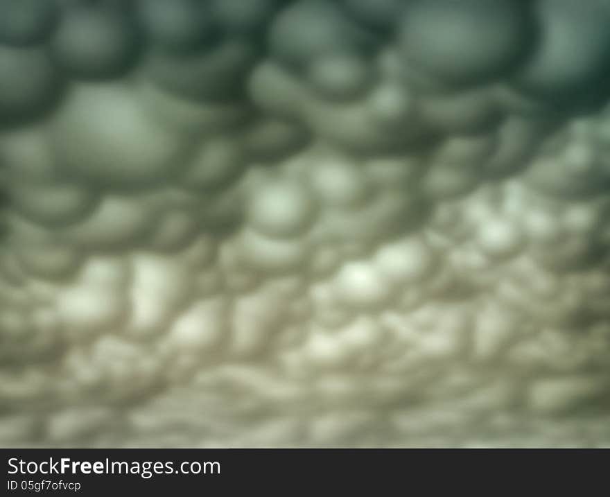 Digital illustration of a stylized sky full of clouds. Digital illustration of a stylized sky full of clouds.