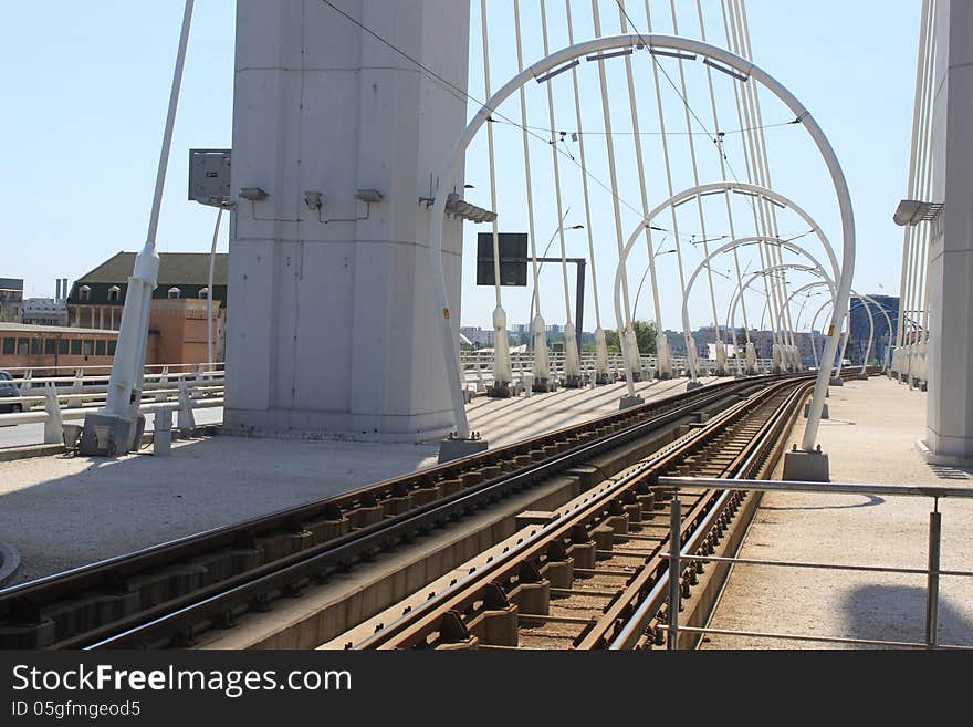 Modern tramline crossing a bridge