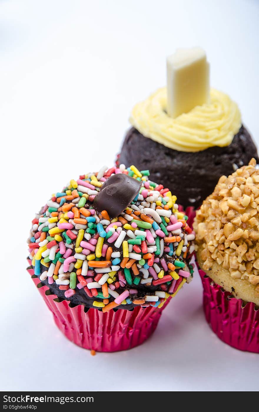 Assorted colorful and decorated cupcakes