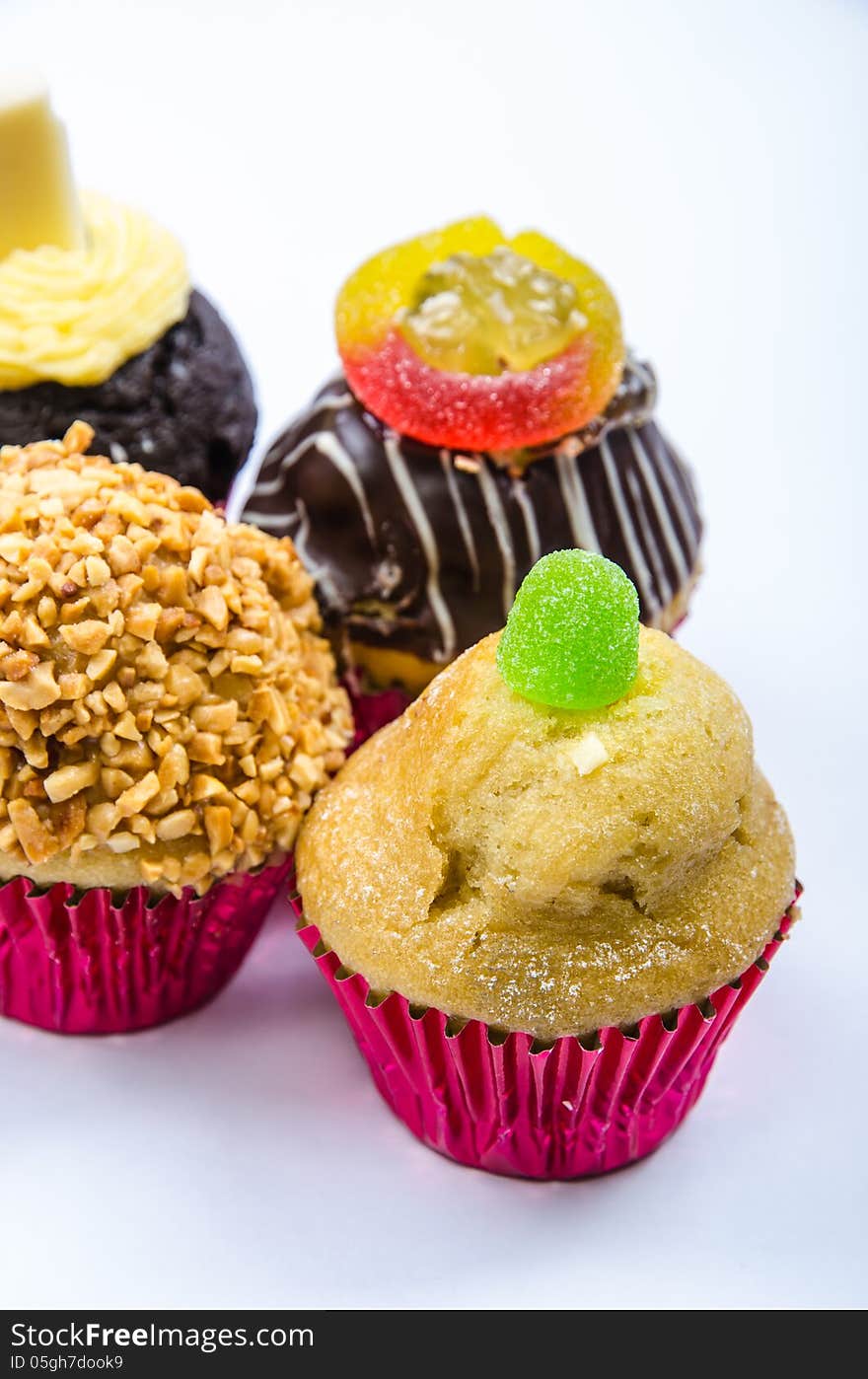 Assorted colorful and decorated cupcakes