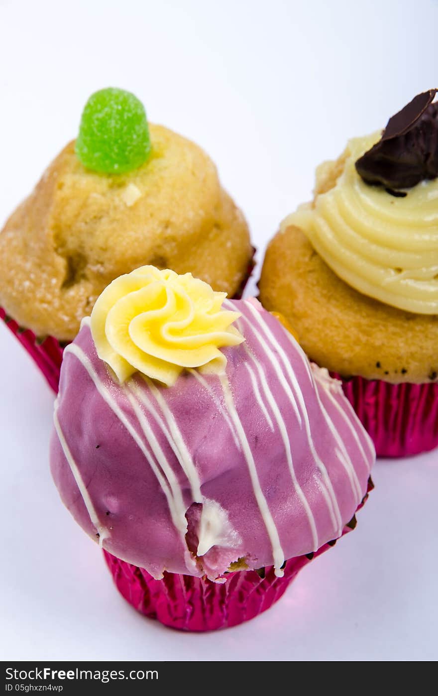 Assorted colorful and decorated cupcakes