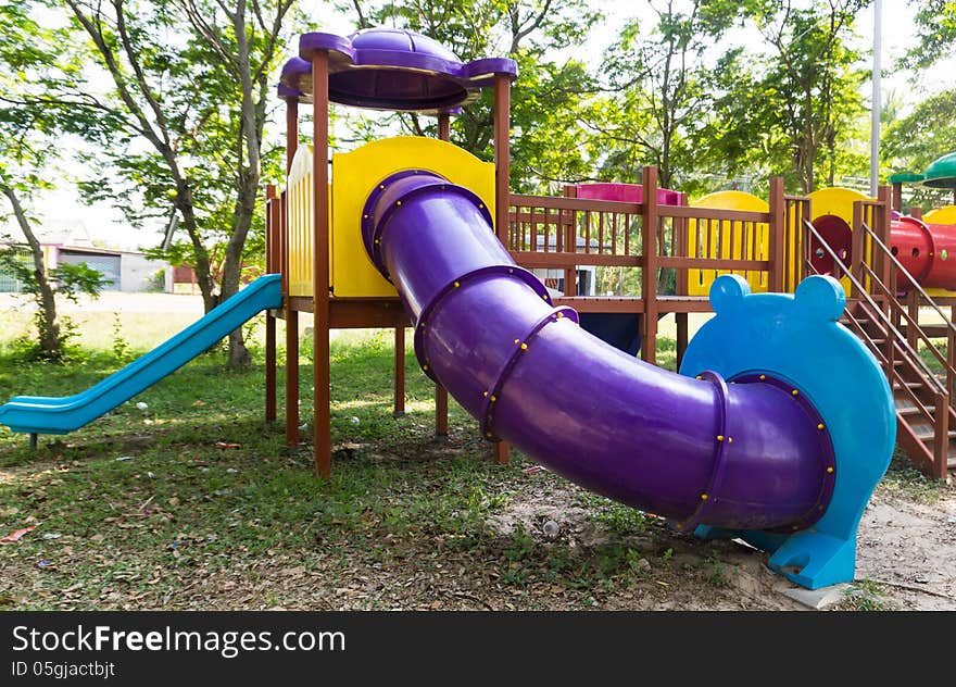 An image of a colorful children playground, without children. An image of a colorful children playground, without children